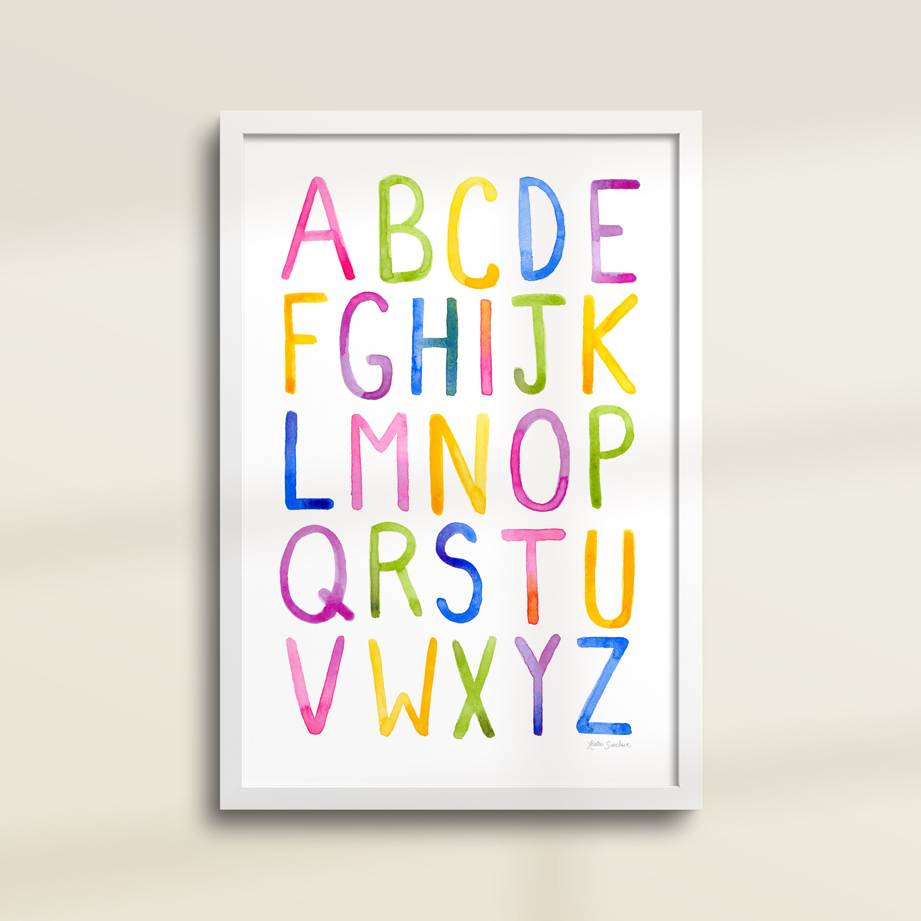 Framed archival watercolor print of a simple alphabet by Katie Sinclair.