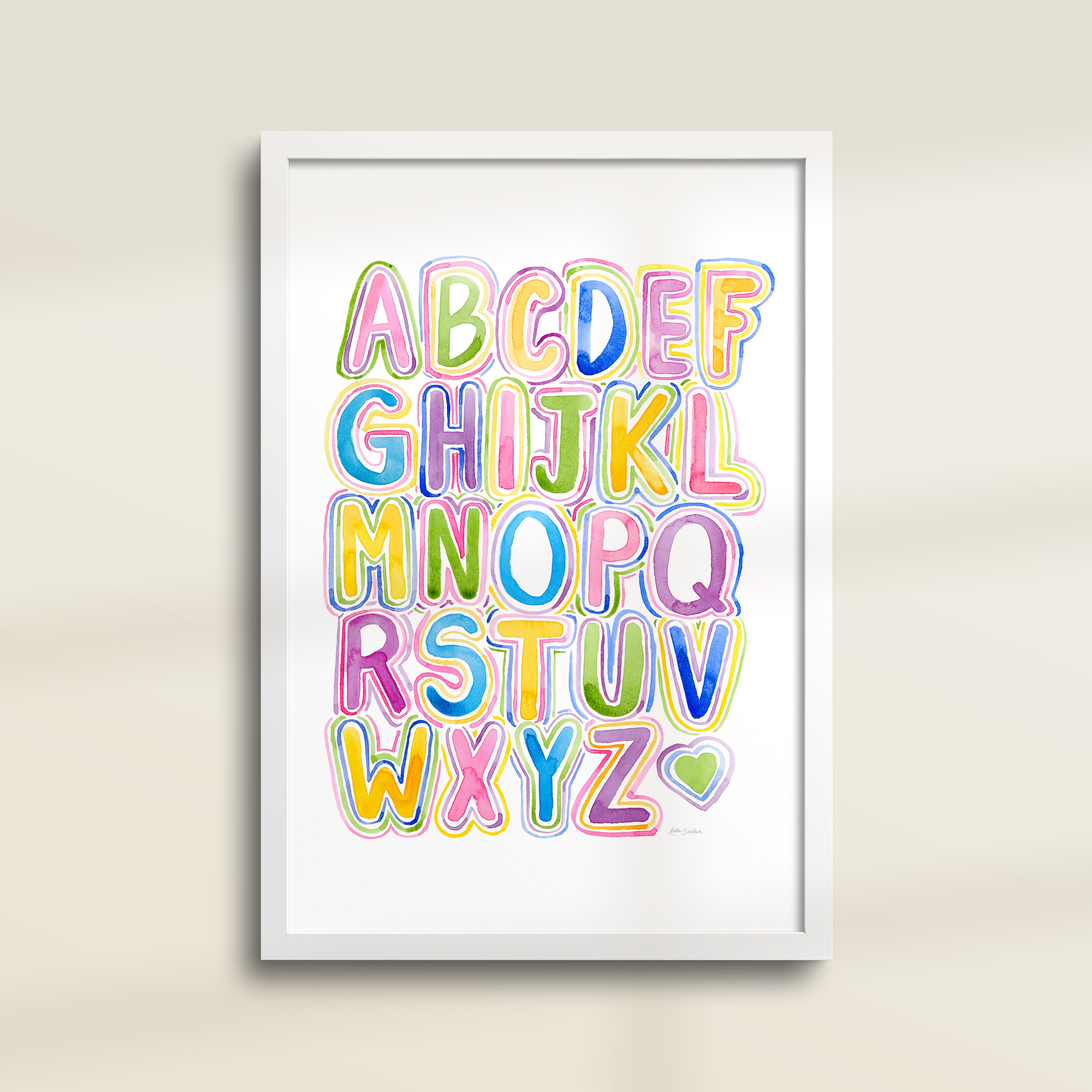 Framed archival watercolor print of a bubble letter alphabet chart by Katie Sinclair.