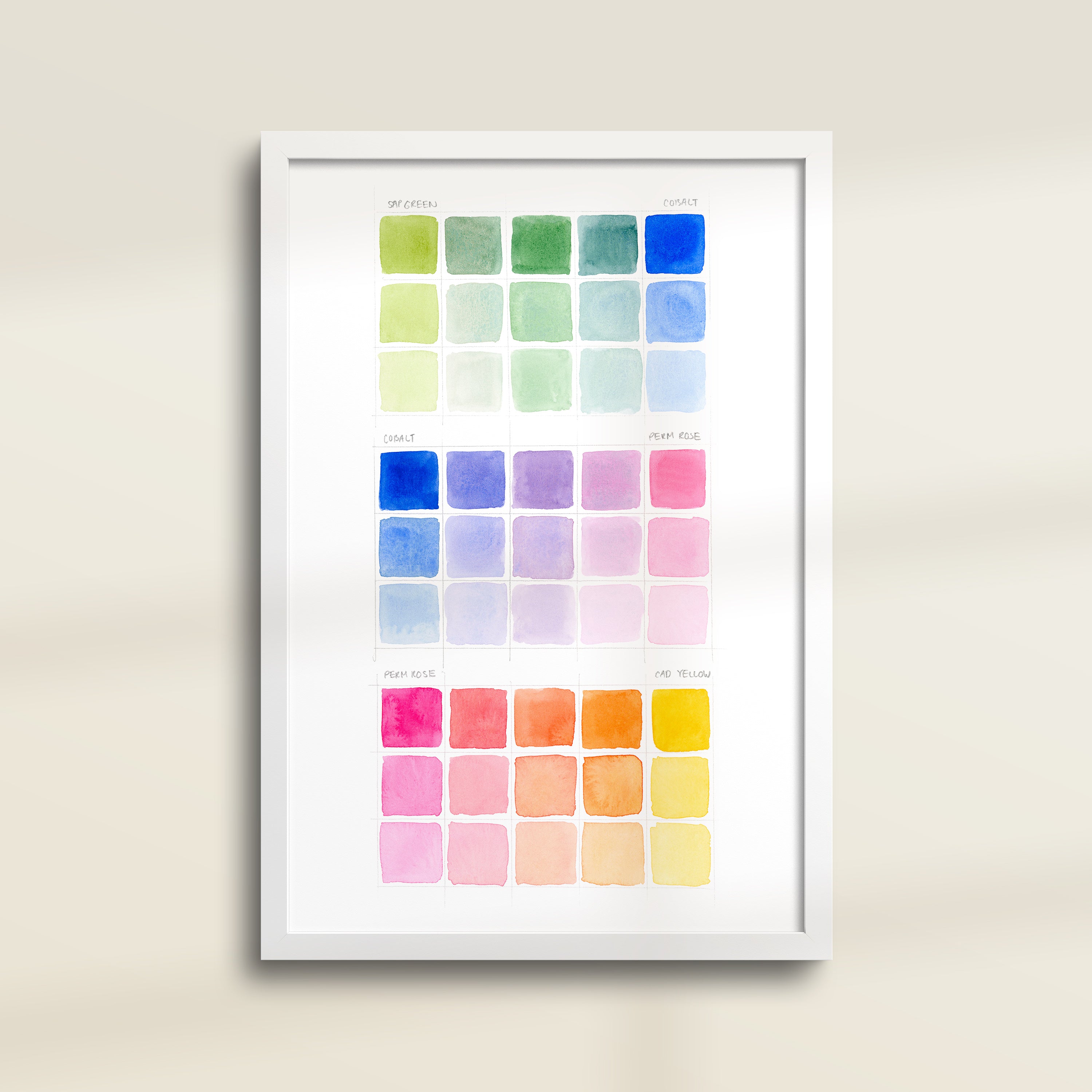 Framed archival watercolor print of color swatches with blue, green, yellow, and pink by Katie Sinclair.