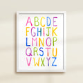 Framed archival watercolor print of a simple alphabet by Katie Sinclair.