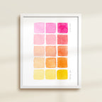 Framed archival watercolor print of a pink and yellow watercolor swatch chart by Katie Sinclair.