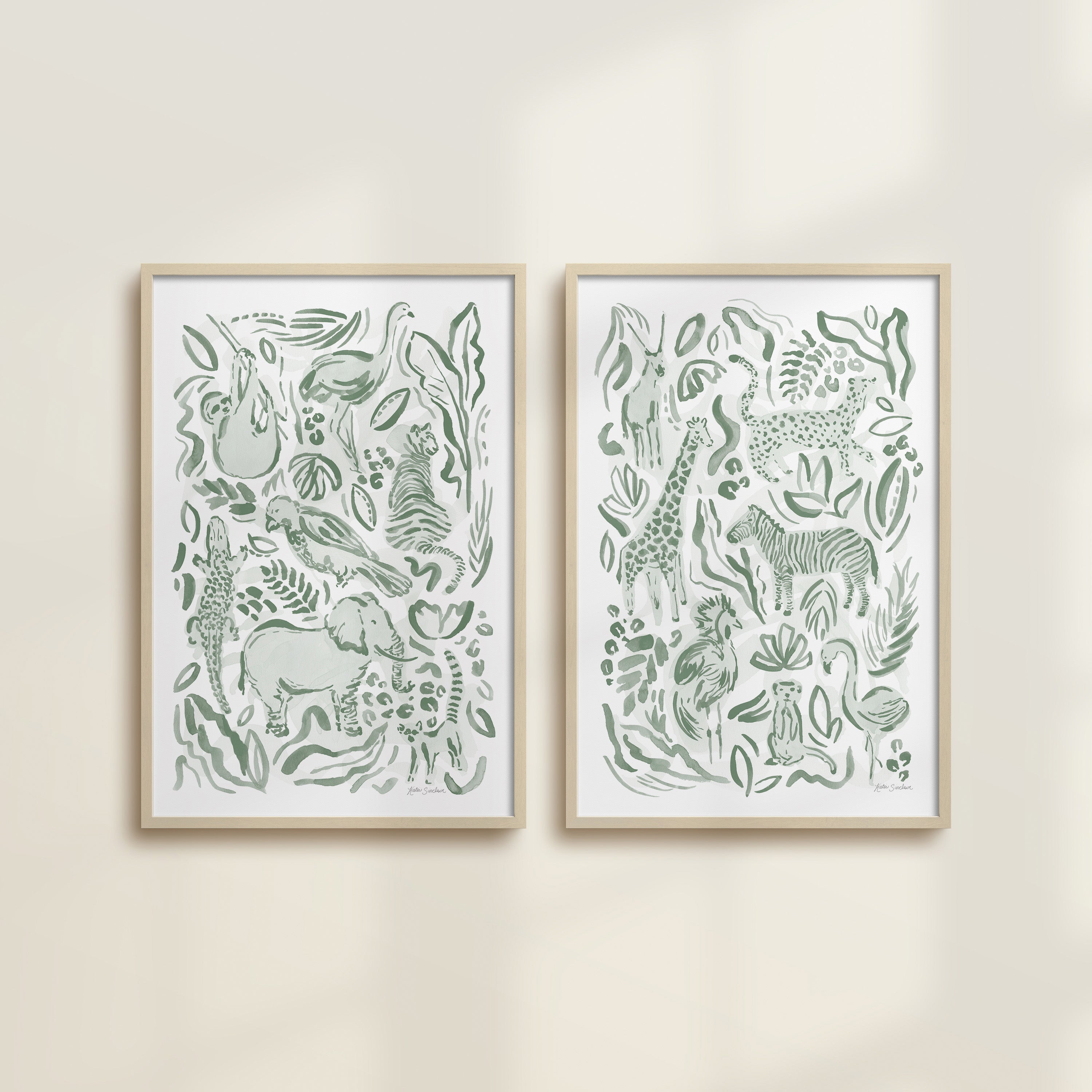 The Safari Jungle watercolor by Katie Sinclair, perfect for nurseries or playrooms.  Featured in the green colorway with wooden frames and no mat.