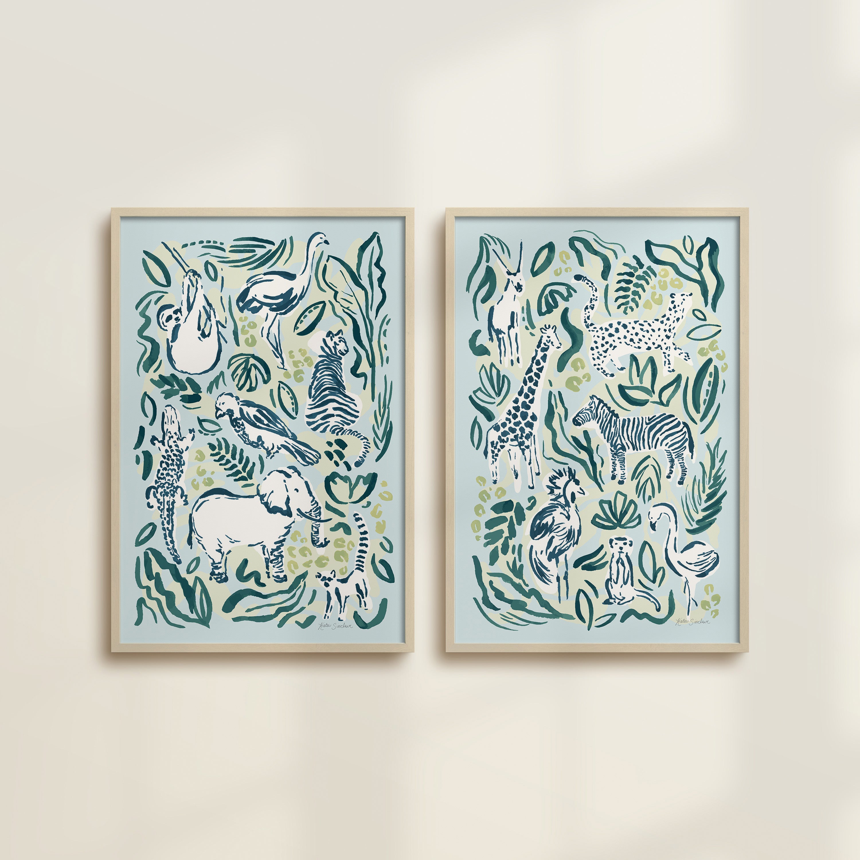 The Safari Jungle watercolor by Katie Sinclair, perfect for nurseries or playrooms.  Featured in the Sundown colorway with wooden frames and no mat.