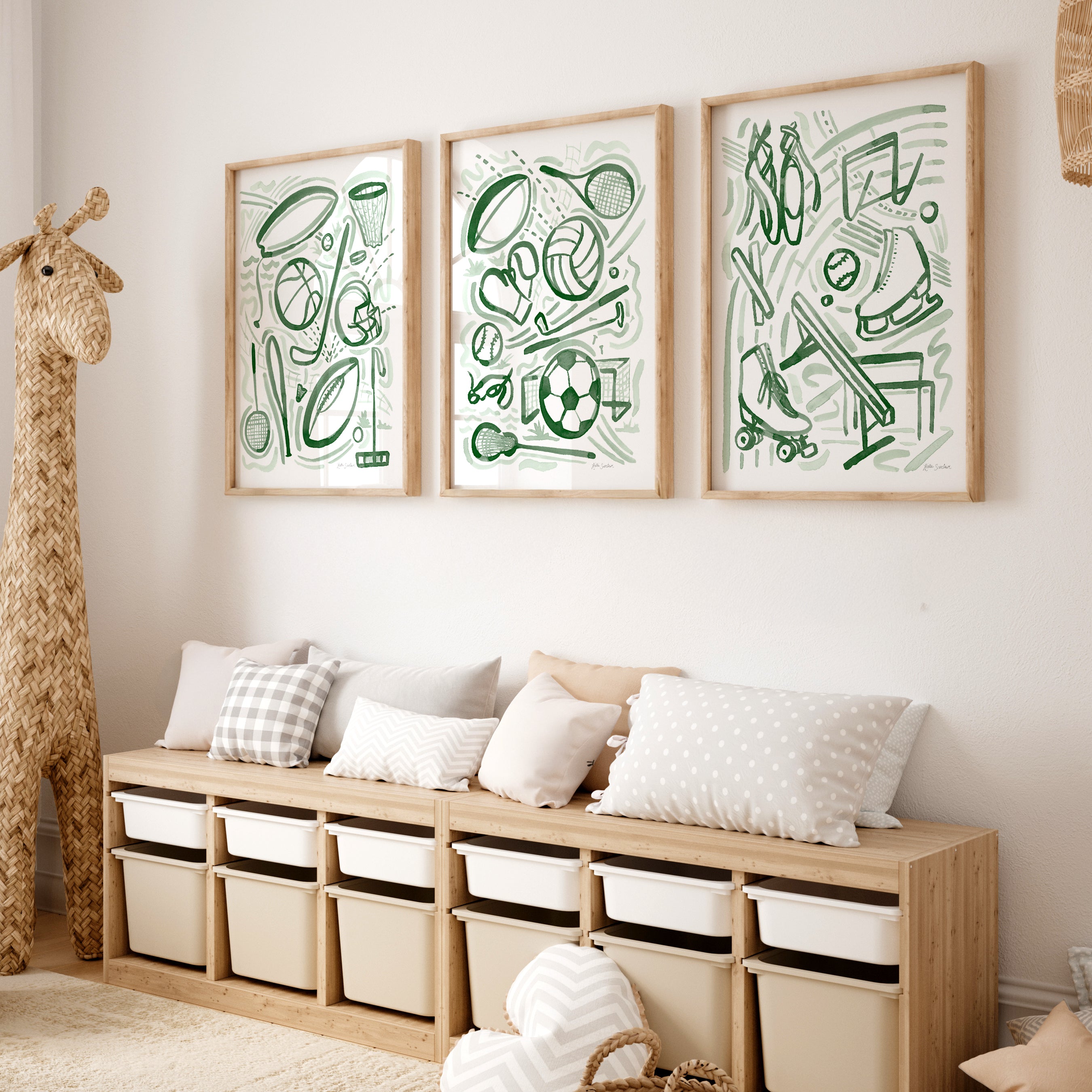 Wooden bench with storage bins against a wall with framed green artwork.
