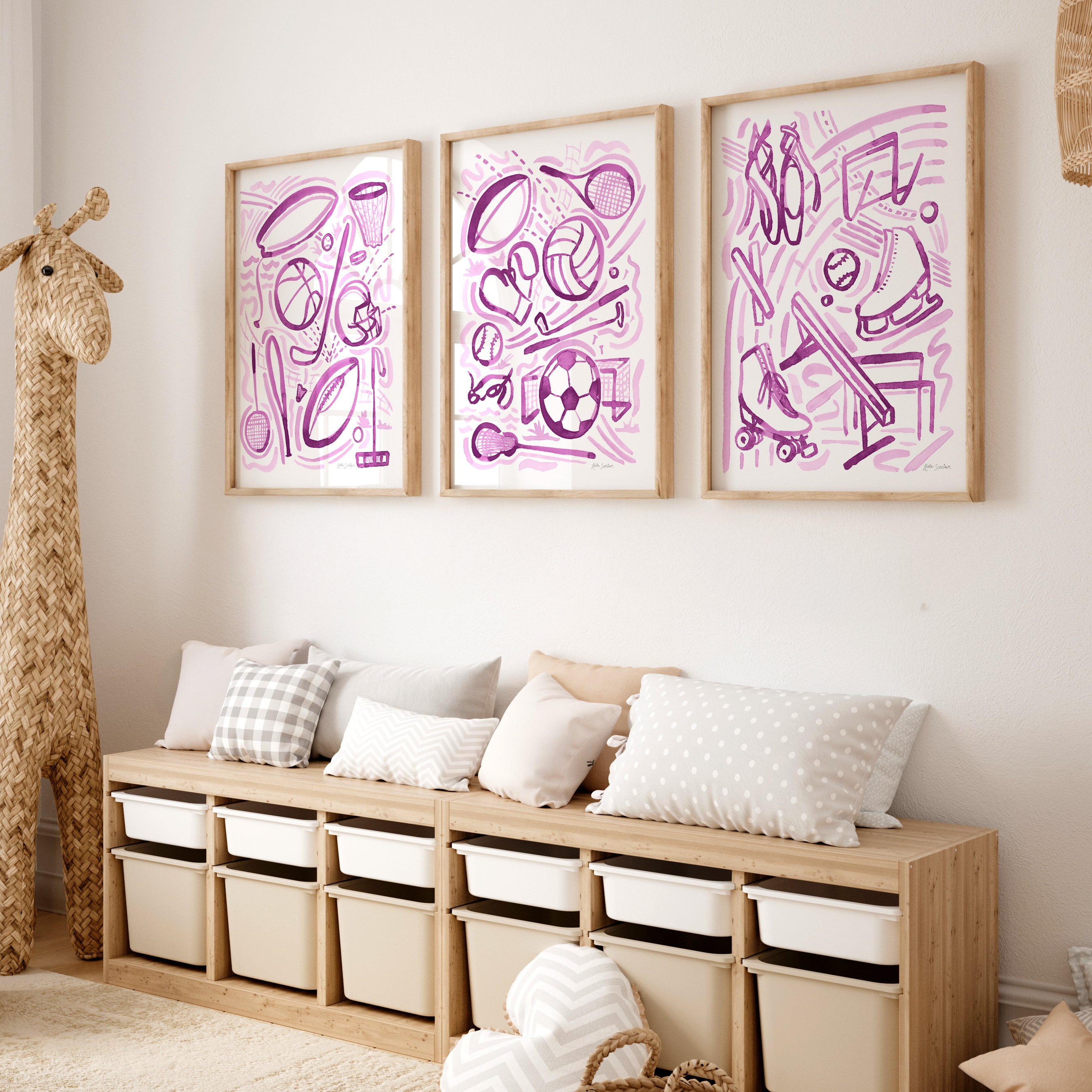 Wooden bench with storage bins against a wall with framed sports purple watercolor abstract art