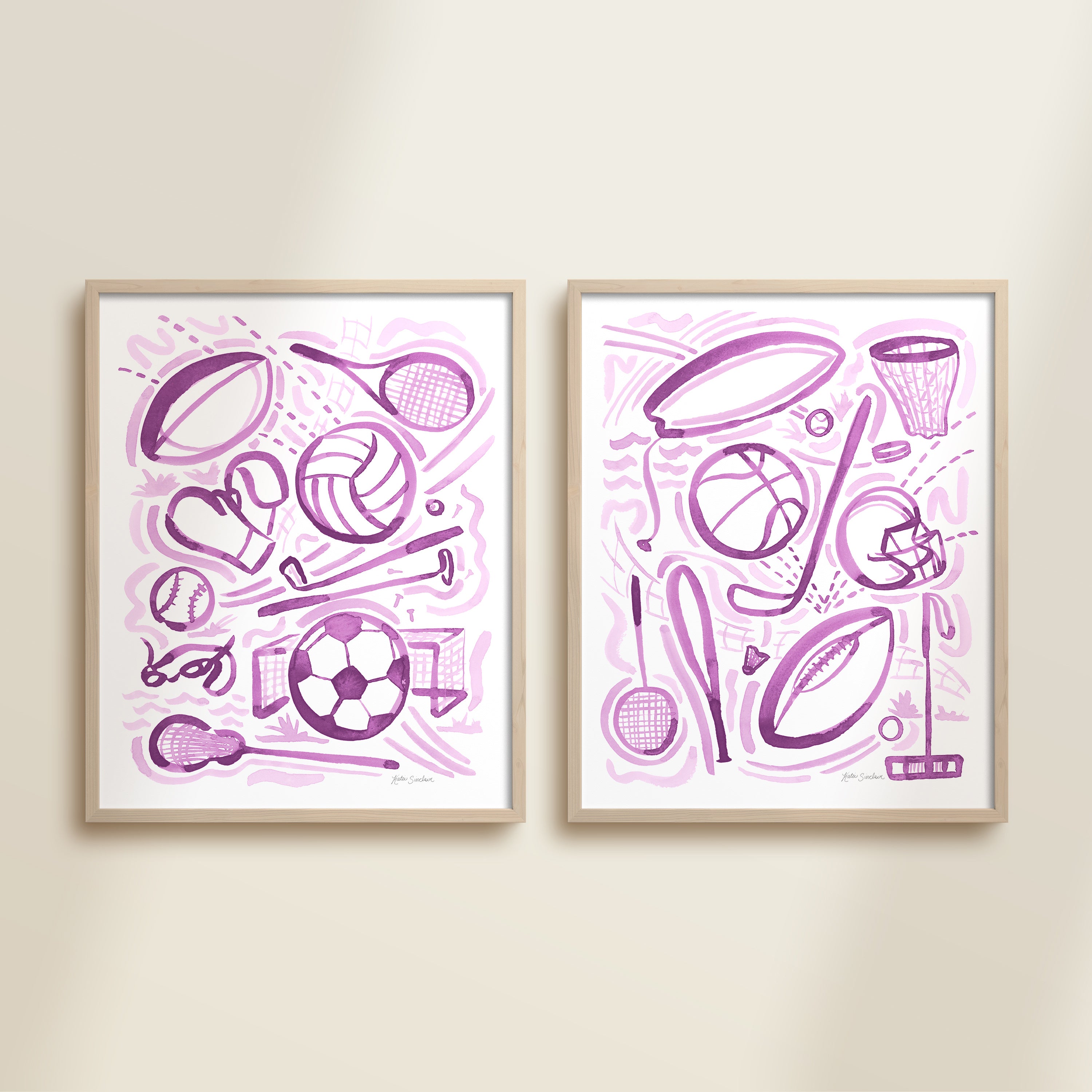 Two framed purple playful sports watercolor art prints in frames featuring tennis, soccer, ballet and baseball for kids nursery or playroom wall décor.  