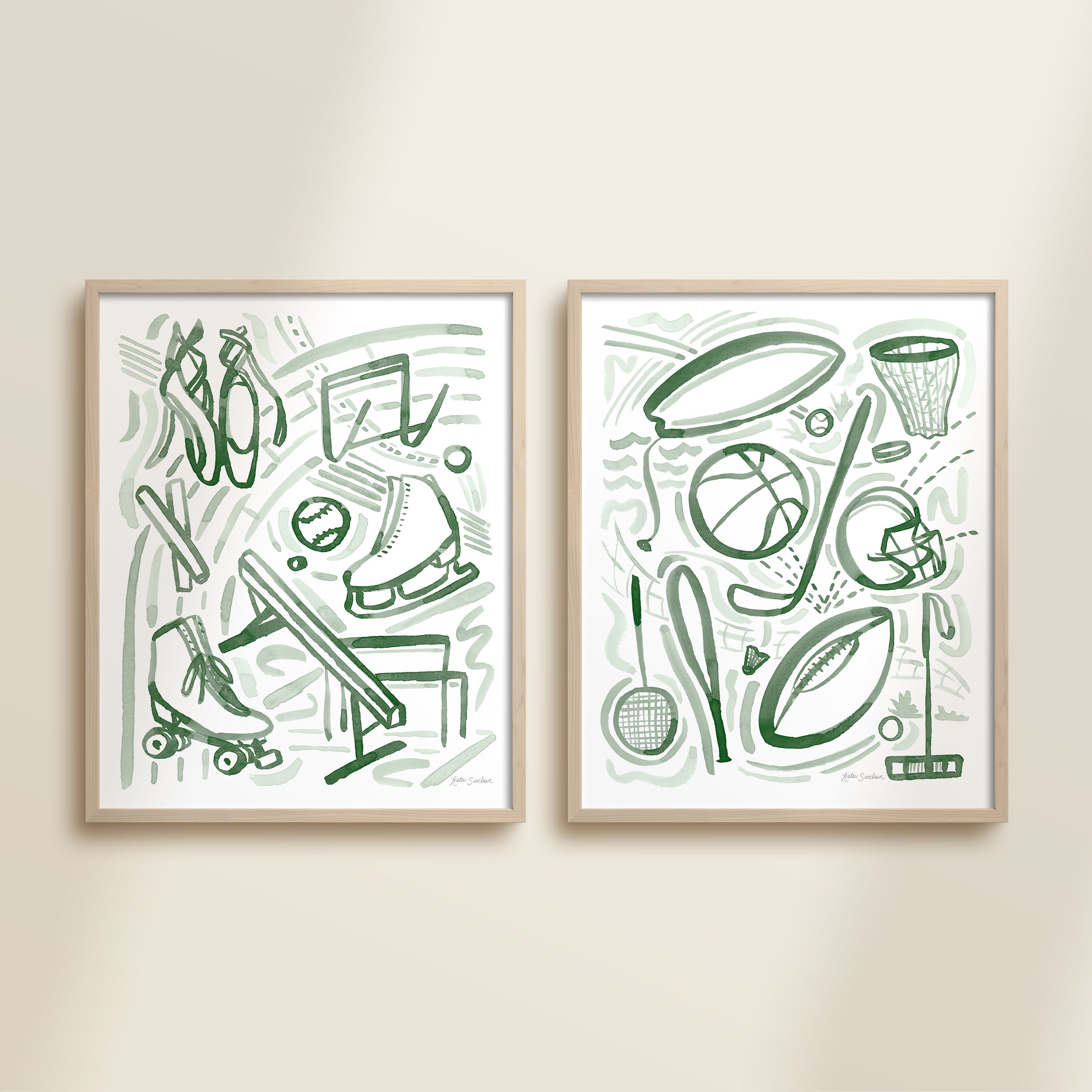 Two framed green playful sports watercolor art prints in frames featuring tennis, soccer, ballet and baseball for kids nursery or playroom wall décor.