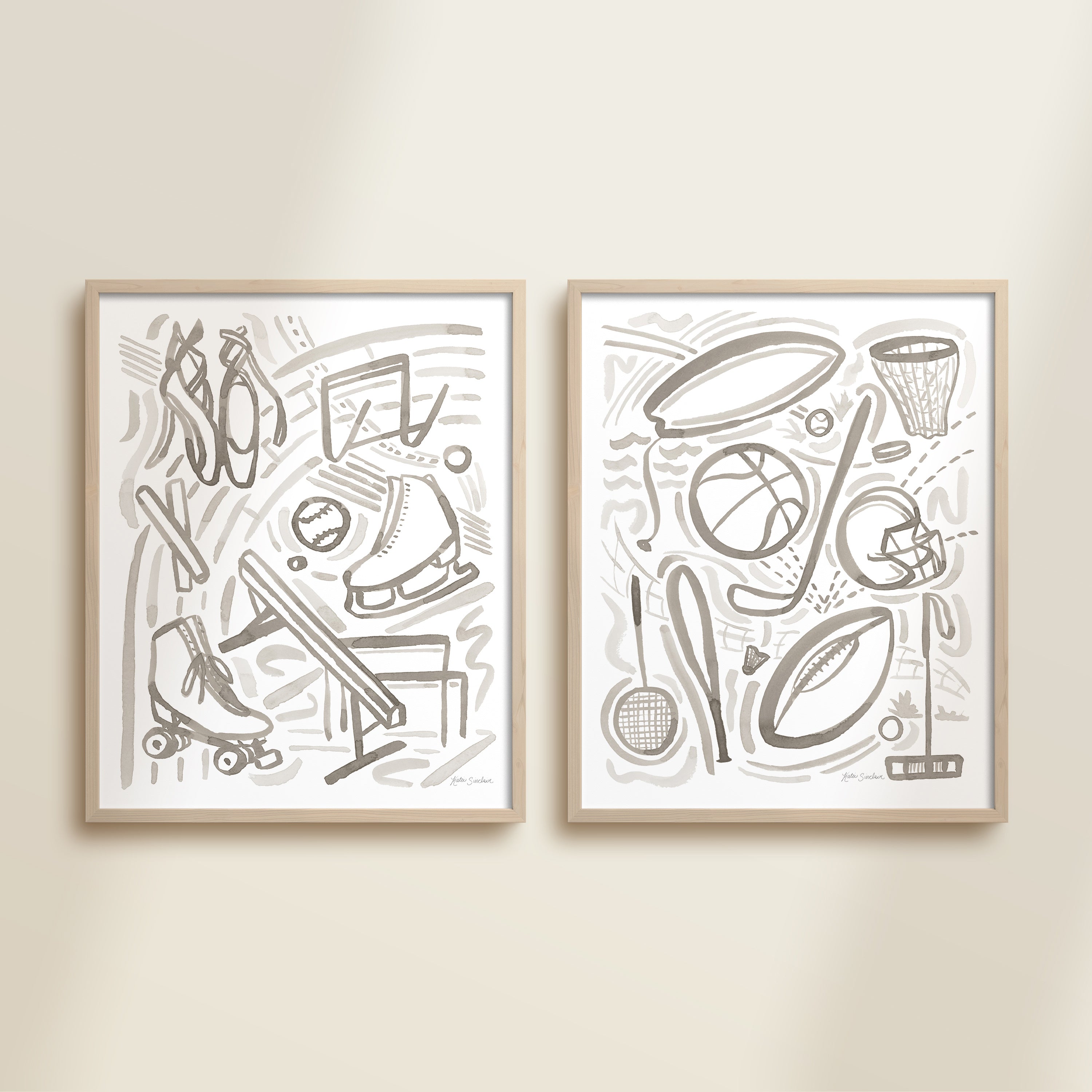 pair of framed gray playful sports watercolor art prints in frames featuring tennis, soccer, ballet and baseball for kids nursery or playroom wall décor.