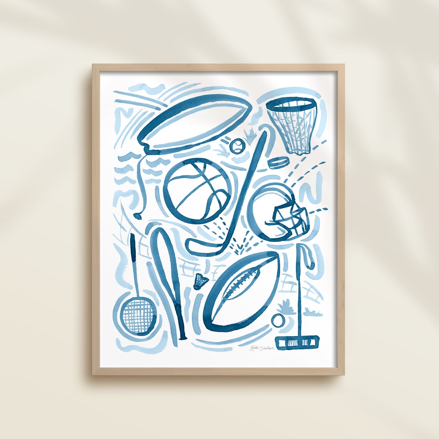 Sports 1 is a watercolor art print featuring basketball, football, surfing, polo, badminton, hockey, and baseball.  It uses blue watercolor on a white background. Perfect for boys’ rooms, nurseries, playrooms.
