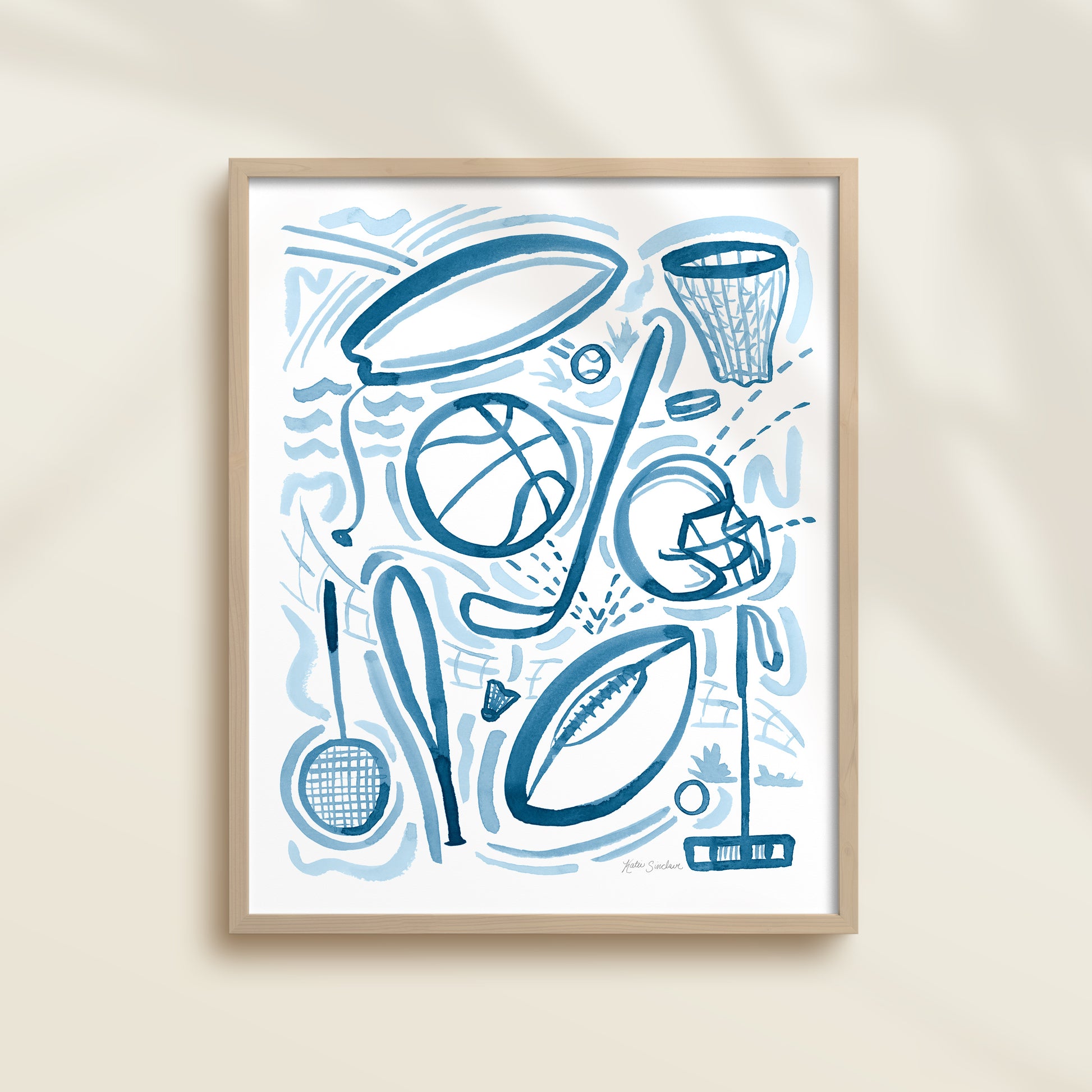 Sports 1 is a watercolor art print featuring basketball, football, surfing, polo, badminton, hockey, and baseball.  It uses blue watercolor on a white background. Perfect for boys’ rooms, nurseries, playrooms.