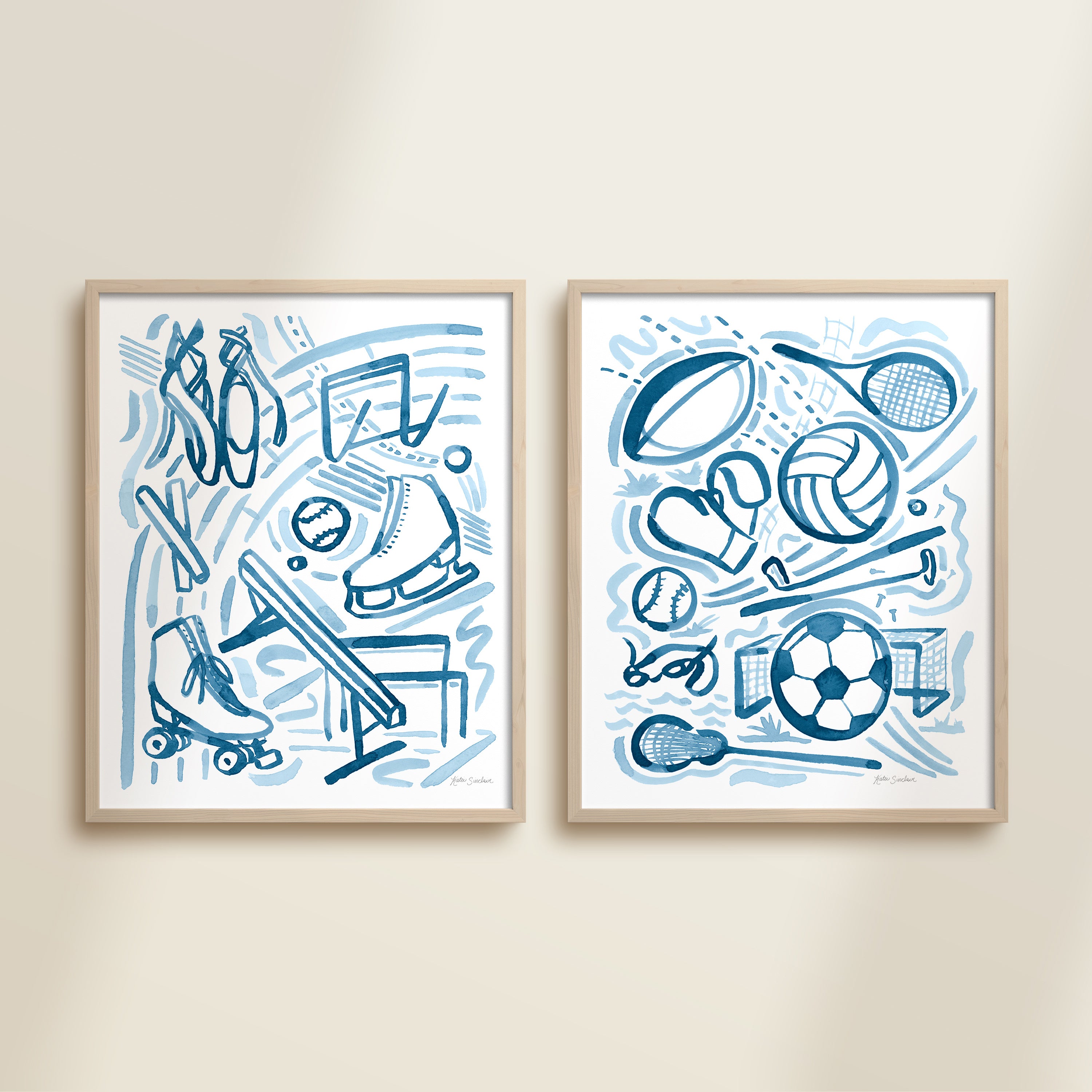 Two framed blue hand-painted watercolor sports illustration detail for children’s room, featuring playful athletic figures, icons, and equipment,