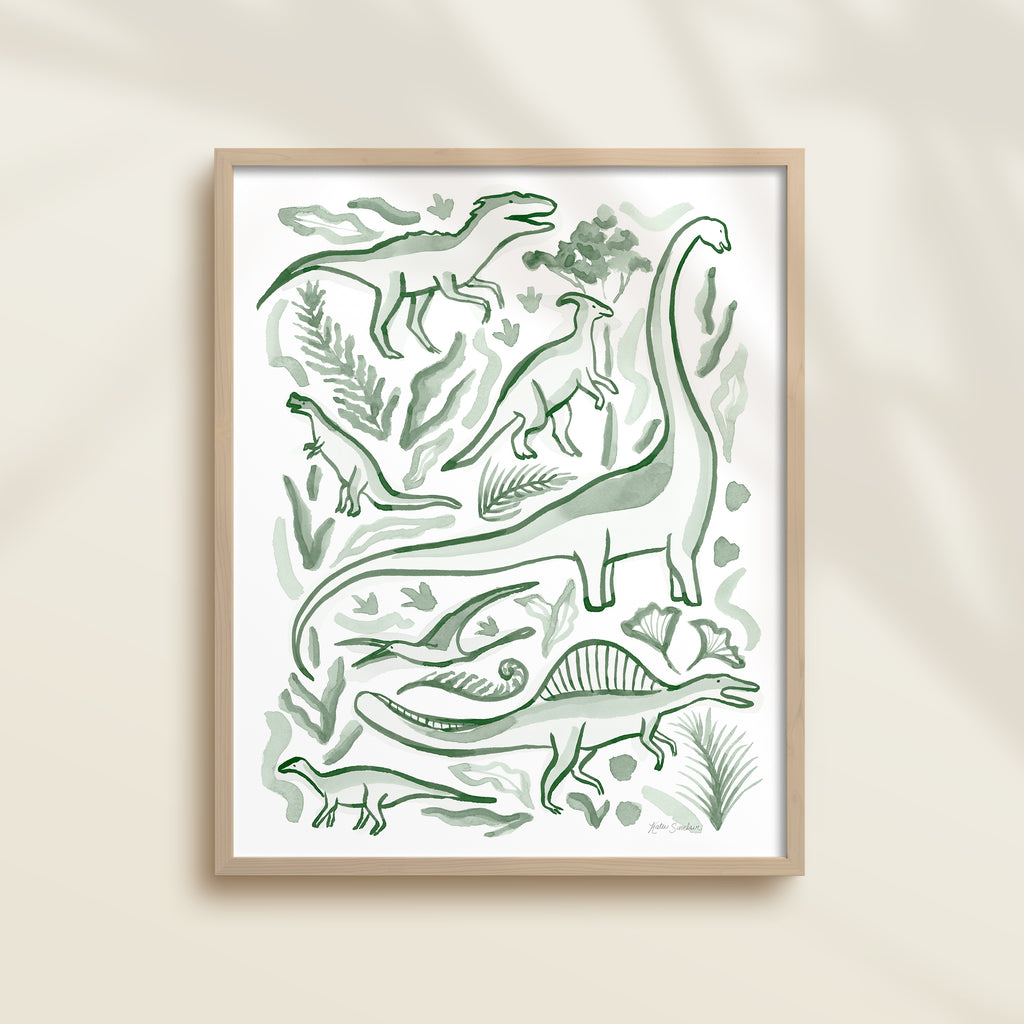Framed hand-painted watercolor abstract artwork with green dinosaur illustrations on a light background, featuring a brontosaurus, spinosaurus, raptor, and pterodactyl. 