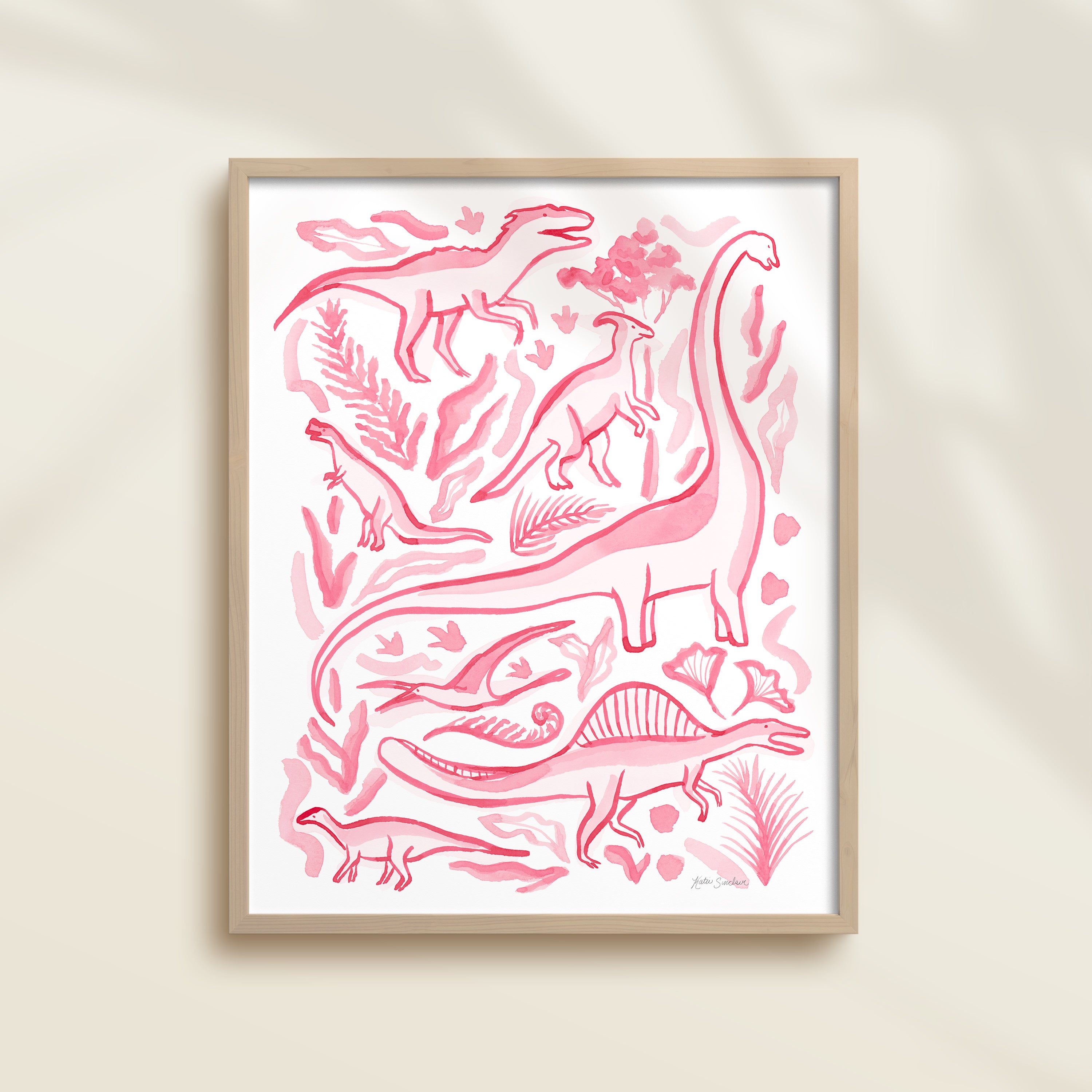 Framed hand-painted watercolor abstract artwork with pink dinosaur illustrations on a light background, featuring a brontosaurus, spinosaurus, raptor, and pterodactyl. 