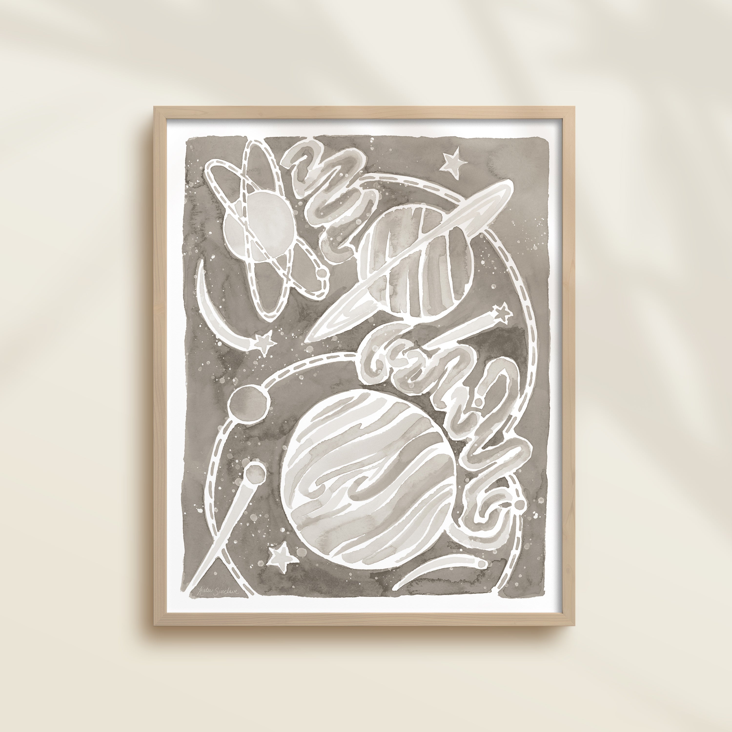Framed gray watercolor artwork of space-themed design with planets, stars, and a galaxy.
