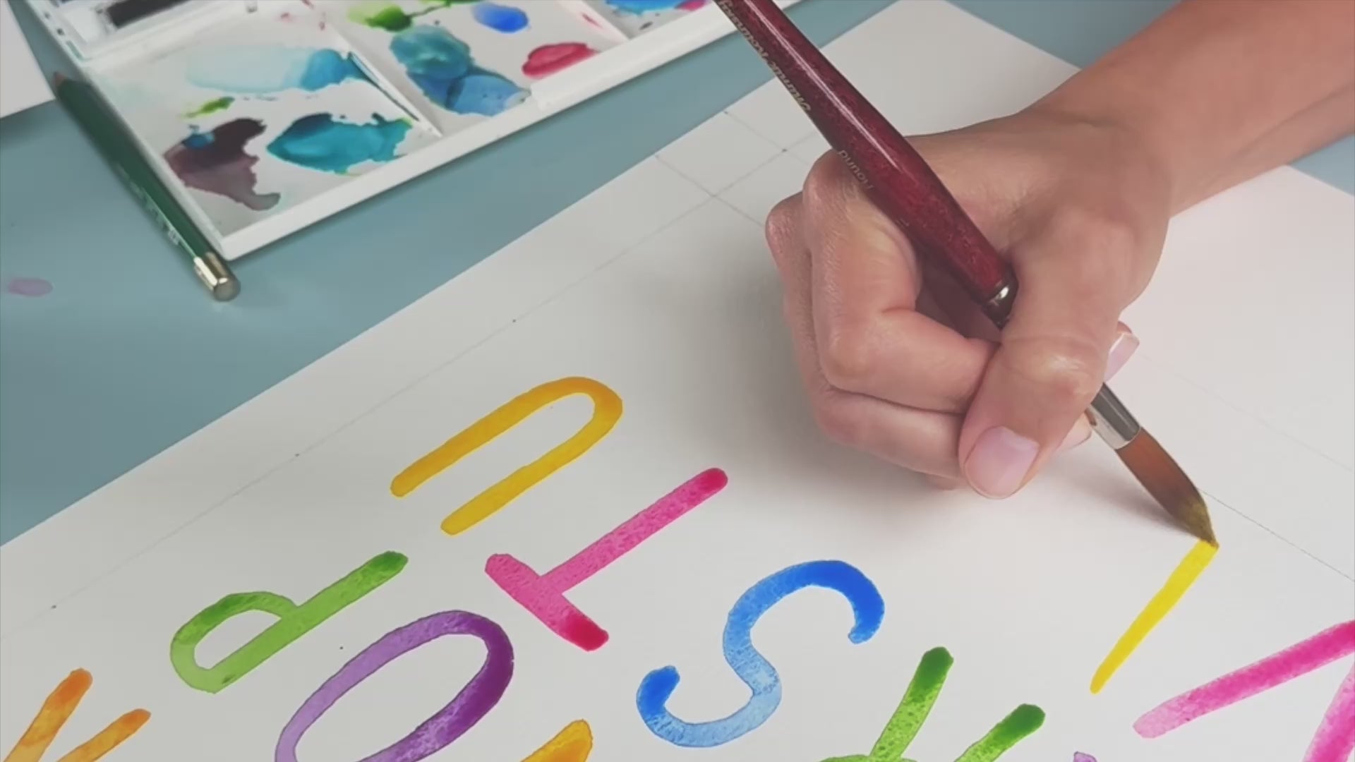 abc 123 watercolor print progress video, showing the watercolor process for the alphabet print