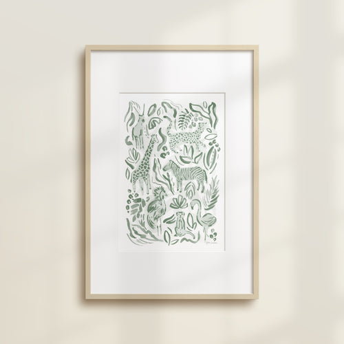 The Safari Jungle Zebra by Katie Sinclair print in the green colorway, in a wooden frame with a white mat.