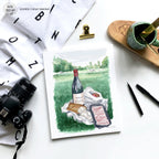 Munich Picnic handmade watercolor art for kids showing a playful picnic with wine and foods in green Englischer Garten watercolor art for a playful, colorful home